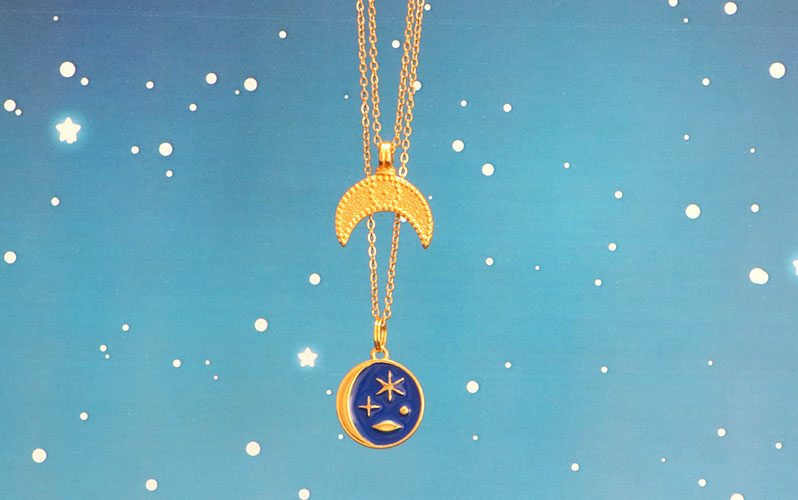 Heavenly chains with moon and star pendants gold plated and blue enamelled 