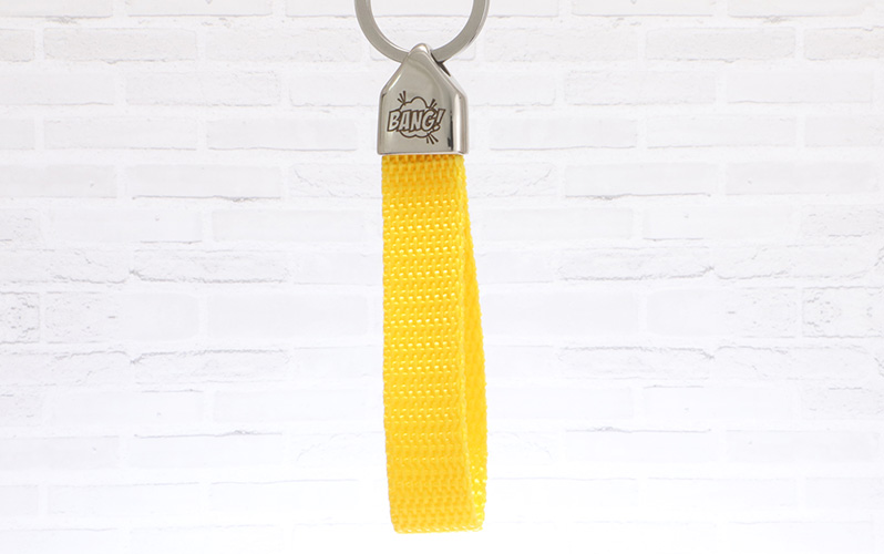Schlüsselanhänger mit Gurtband und gravierter Edelstahl Endkappe "Wow" 