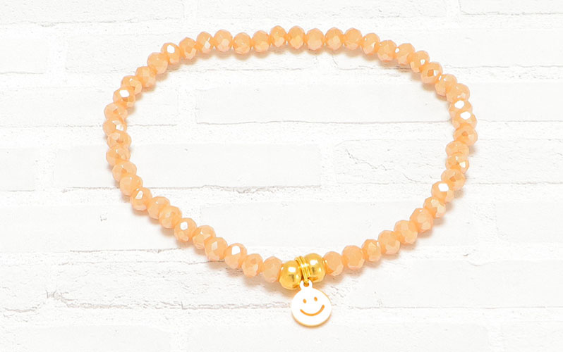 Bracelet avec perles à facettes et smiley 