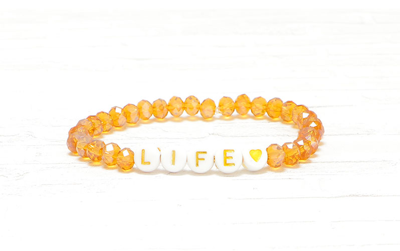 Bracelet with letter beads with gold lettering Life 
