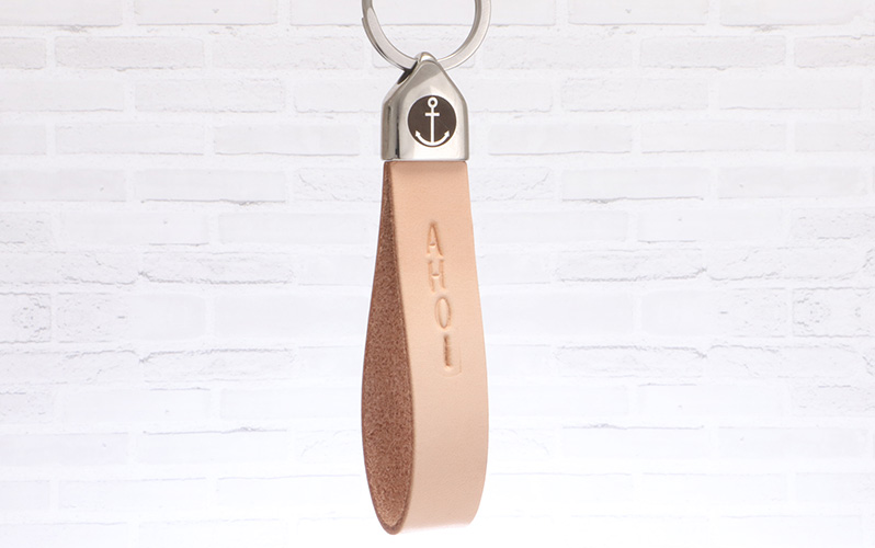 Schlüsselanhänger mit Lederband und gravierter Edelstahl Endkappe "Anker" 