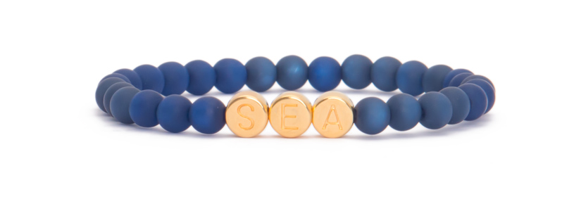 Bracelet with gold-plated letter beads Sea 