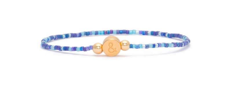 Bracelet with gold-plated letter beads & 