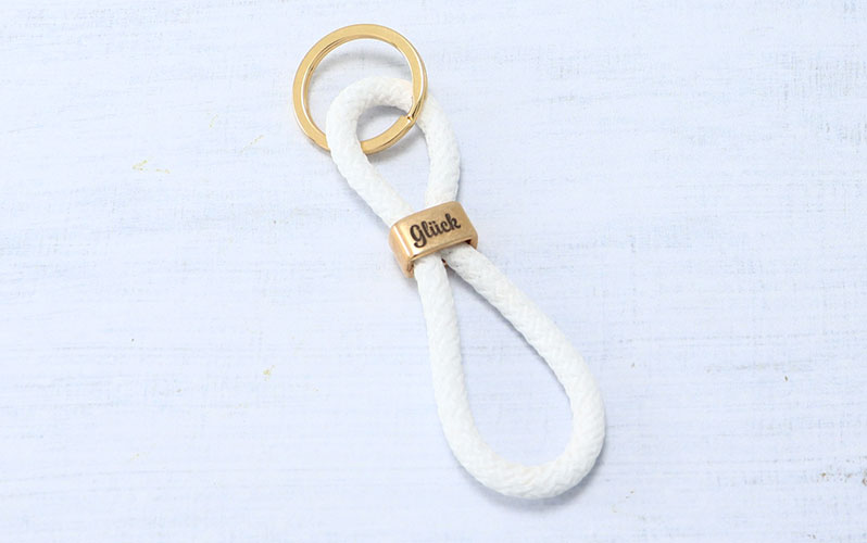 Porte-clés avec corde à voile et gravure "Bonheur". 
