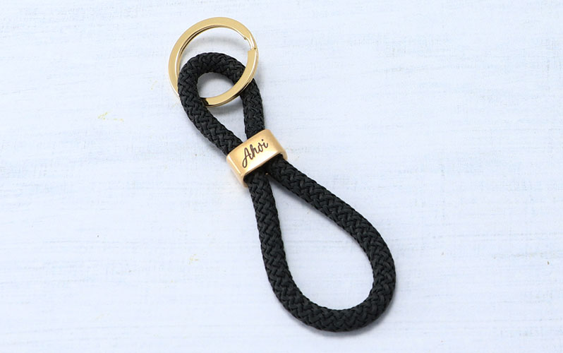Porte-clés avec corde à voile et gravure "Ahoi" doré 